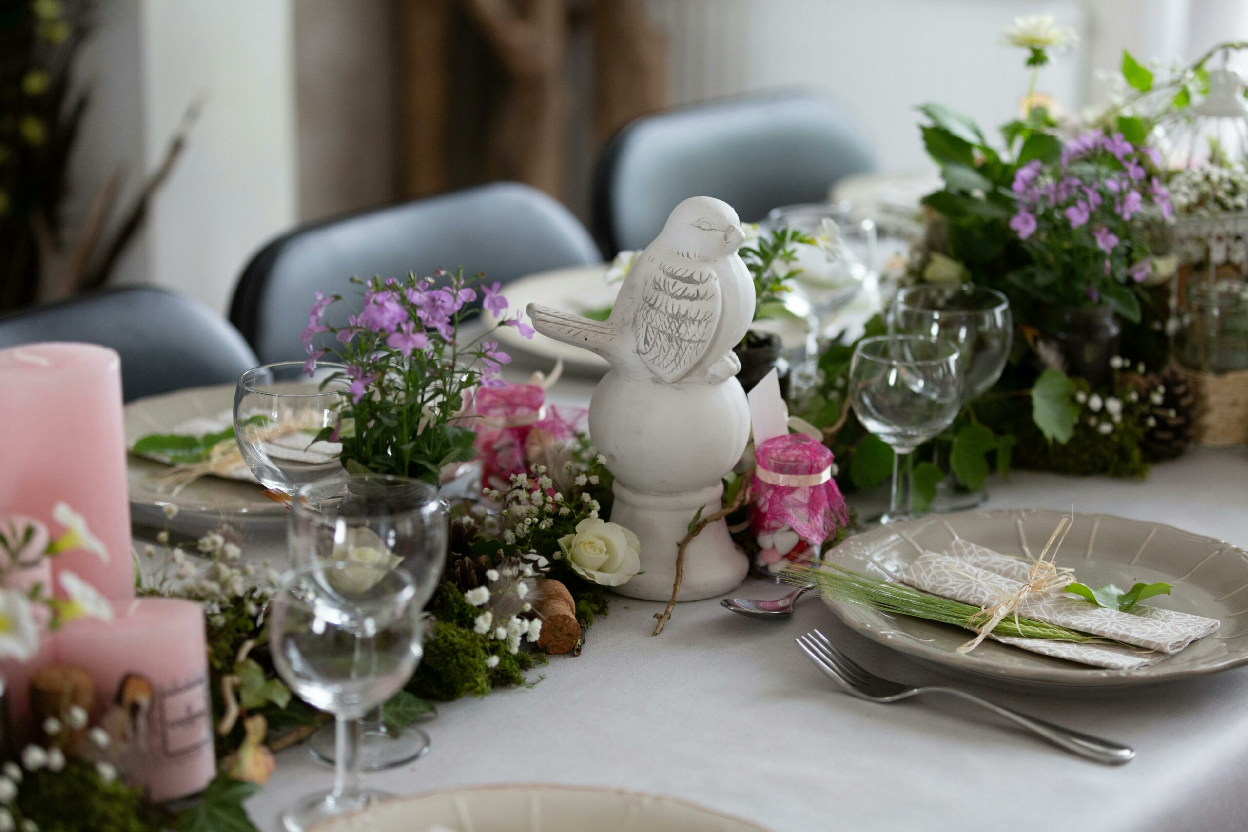 Tablescape decor in pastel colors with dove decor in the center