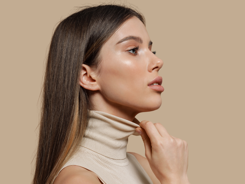 woman with turtleneck and long hair with low porosity